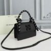 Off-White Leather Insert Black Gummy with Metallic Black Arrows At Front. Rope Handle Jitney 1.4 Shoulder Bag (D88532 Black)